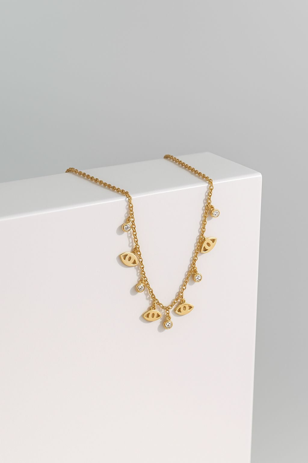 COLLAR -OJOS TURCOS DORADOS