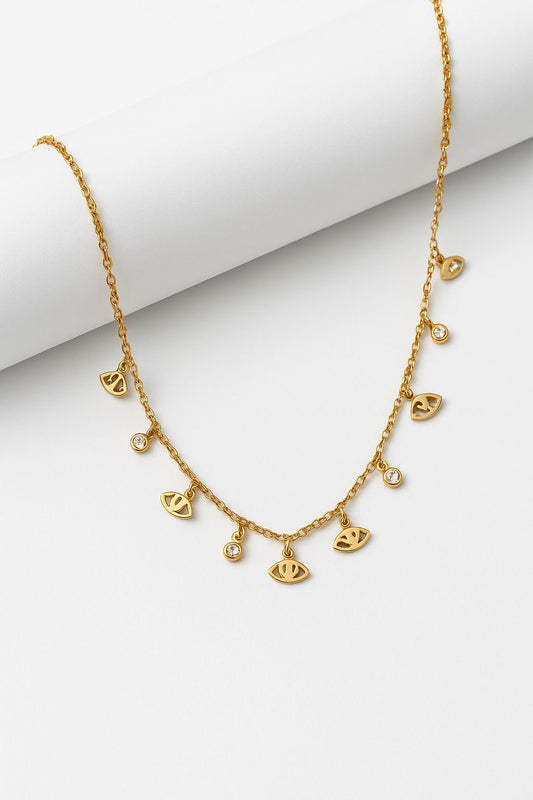 COLLAR -OJOS TURCOS DORADOS