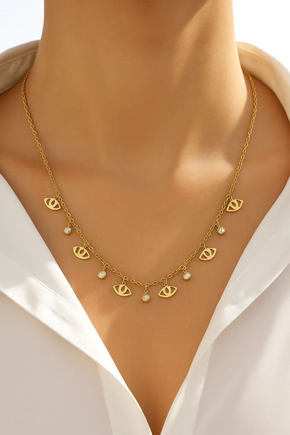 COLLAR -OJOS TURCOS DORADOS