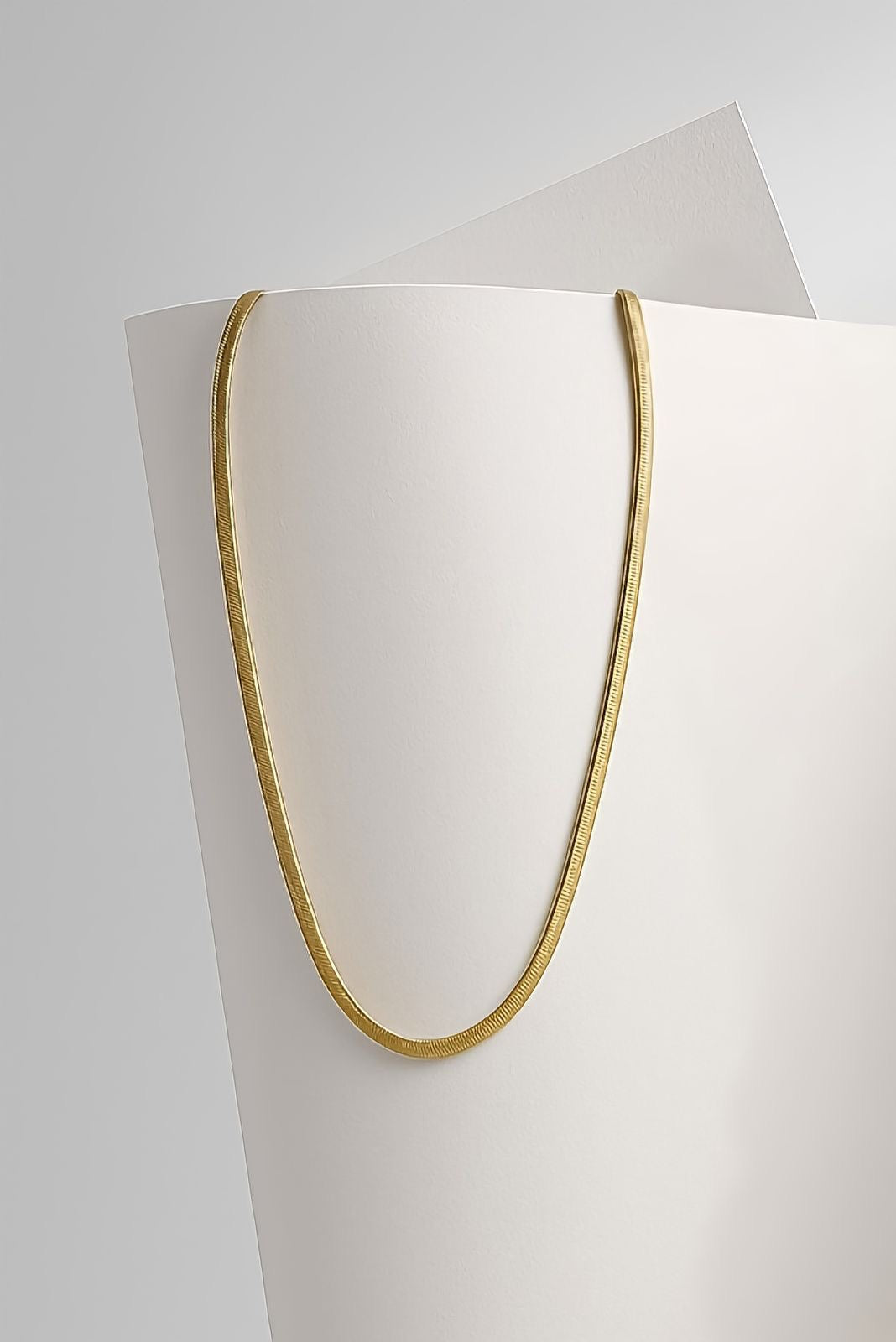 COLLAR - LAZO DORADO