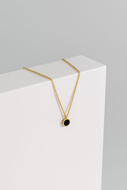 COLLAR - CIRCULO NEGRO DORADO