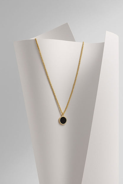 COLLAR - CIRCULO NEGRO DORADO